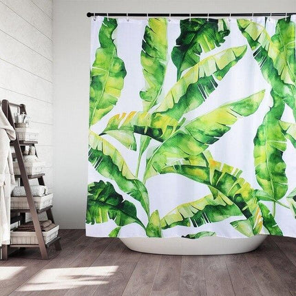 Trooppinen suihkuverho vihreillä banaaninlehdillä