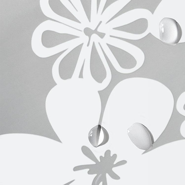 Puoliläpinäkyvä suihkuverho valkoisella kukkakuviolla