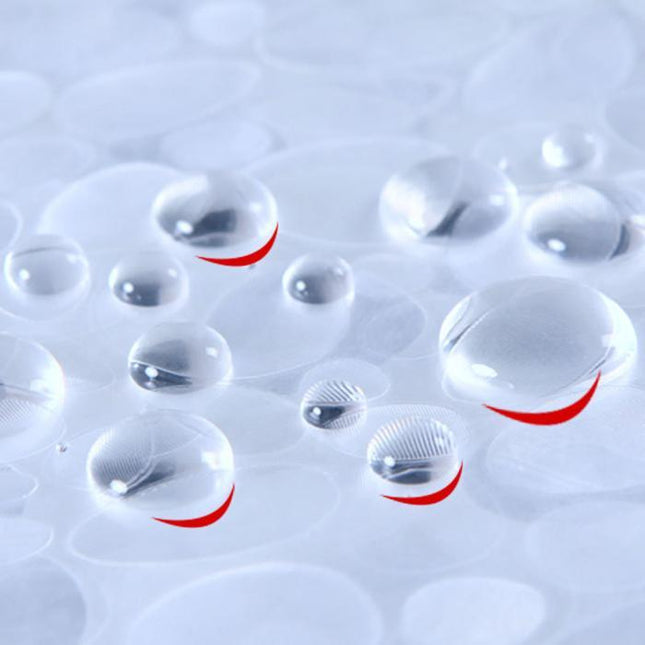 Läpinäkyvä suihkuverho kimaltelevalla kuviolla